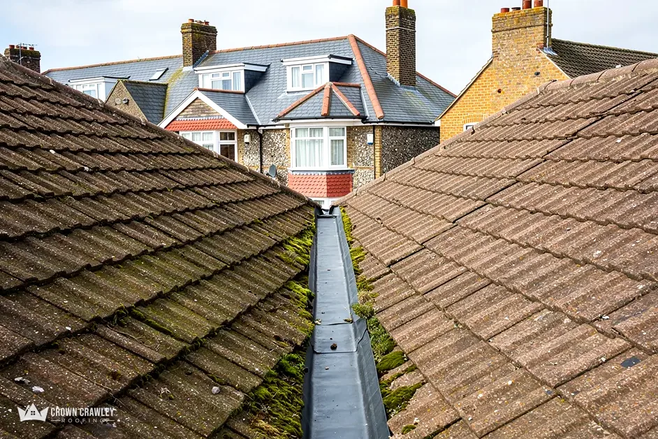 Lead-lined valley gutter between two tiled roof slopes
